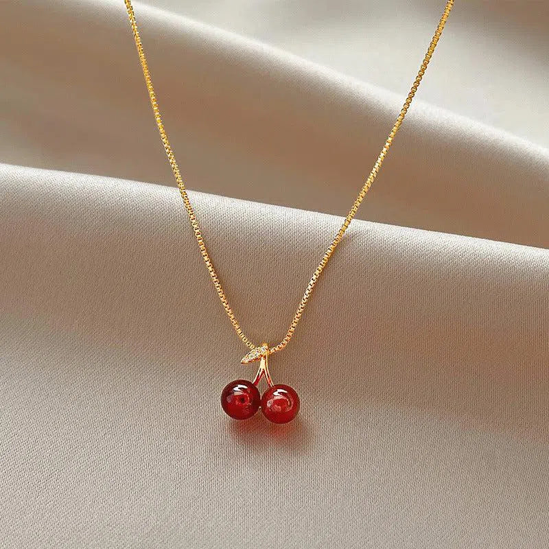 Cléora | Gold necklace with sparkling cherry pendants
